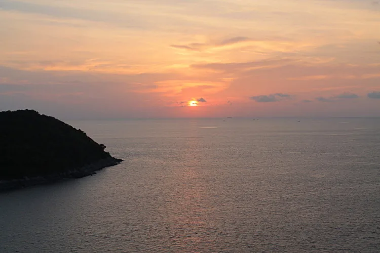 A highlight when you travel to Phuket is seeing sunsets like this one at Naiharn