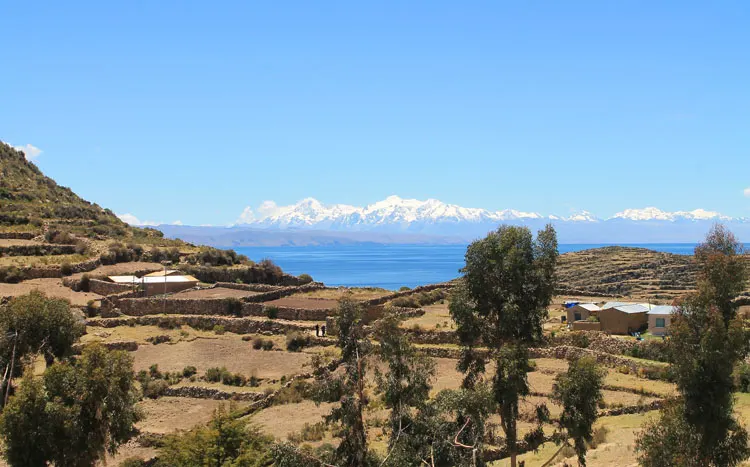 Hiking Isla del Sol, Bolivia: Farmland, snow mountains and Lake Titicaca